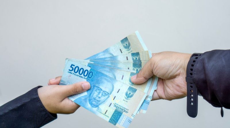 ilustrasi tukar uang (canva.com)